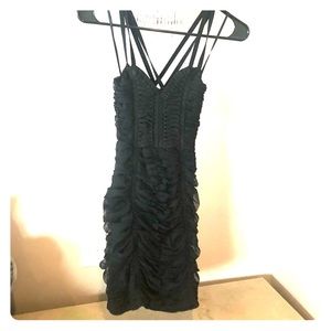 Strappie fitted black dress with cute detail